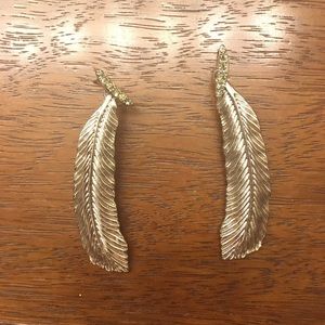 Silver-toned feather dangly earrings